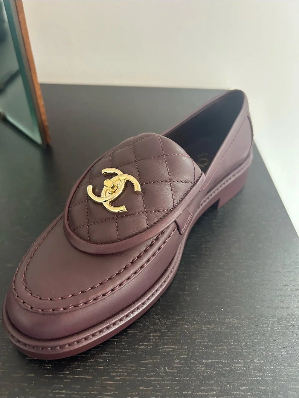 Chanel 2025 turnlock quilted loafers in burgundy 37